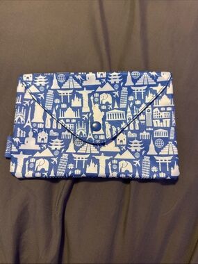 Blue & White Travel Icon Envelope Clutch by ipsy